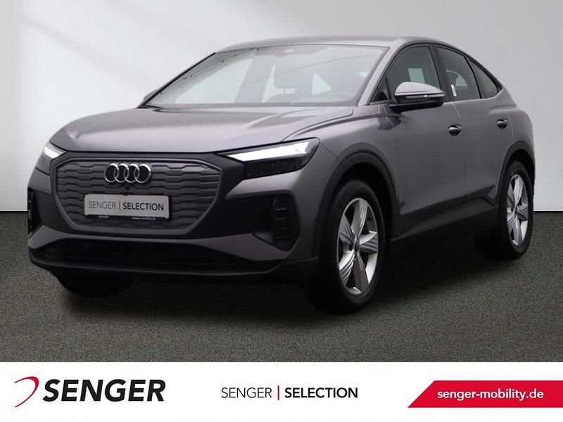 Taifungrau metallic Gebraucht 2022 Audi Q4 Sportback e-tron Basis SUV | 31.880 € (Teuer) - Bild 1/4