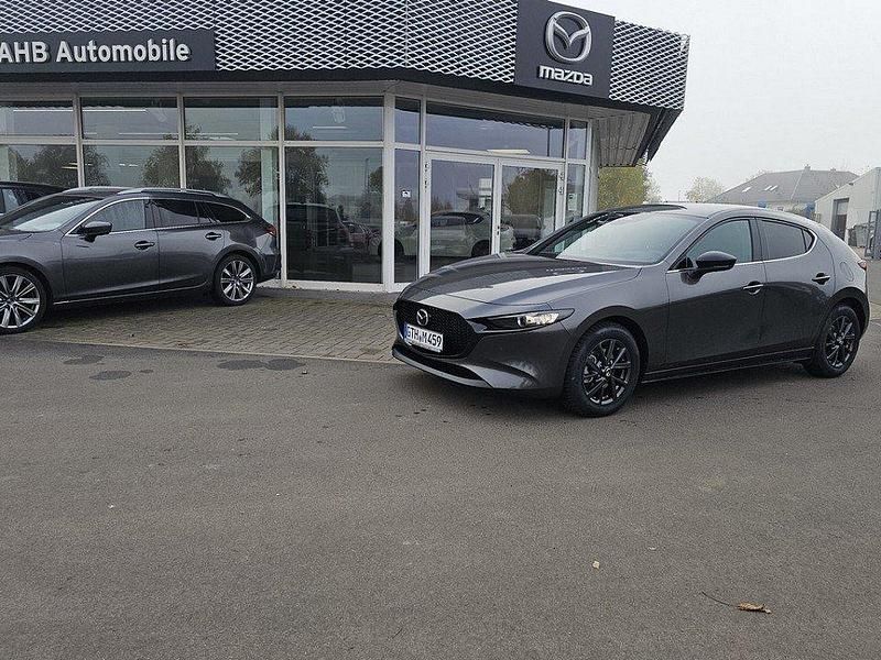 Machine gray Gebraucht 2024 Mazda 3 Homura-Line | 28.990 € (Teuer) - Bild 1/4