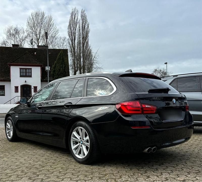 Gebraucht BMW 520 184 PS (135 kW) 2012 Schwarz Kombi