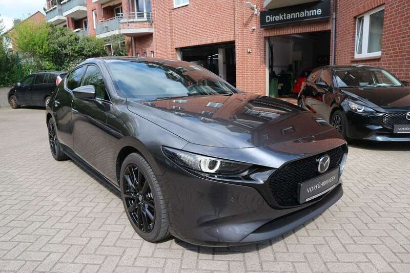 Grau Gebraucht 2024 Mazda 3 Exclusive-Line Limousine | 26.990 € (Guter Preis) - Bild 1/4