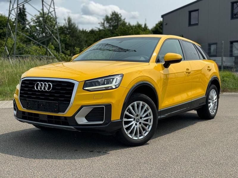 Gelb Gebraucht 2017 Audi Q2 Design SUV | 13.590 € (Guter Preis) - Bild 1/4