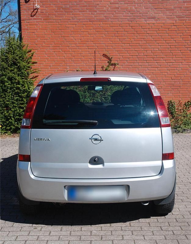 Second-hand Opel Meriva 87 CP (63 kW) 2003 Argintiu Monovolum