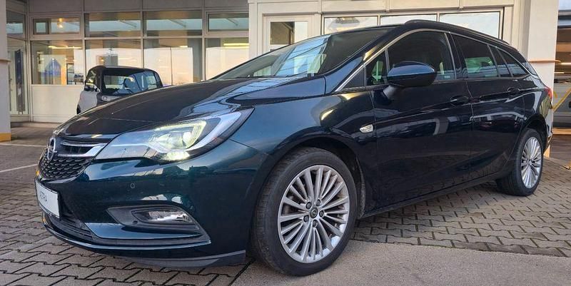 Grün Gebraucht 2016 Opel Astra Innovation Kombi | 12.699 € (Fairer Preis) - Bild 1/4