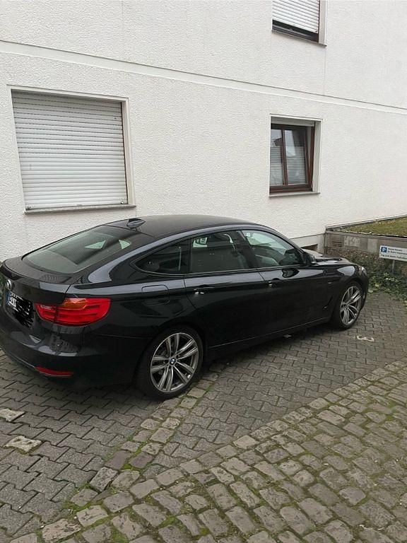 Schwarz Gebraucht 2013 BMW 320 Gran Turismo Sport Line Limousine | 10.900 € (Guter Preis) - Bild 1/4