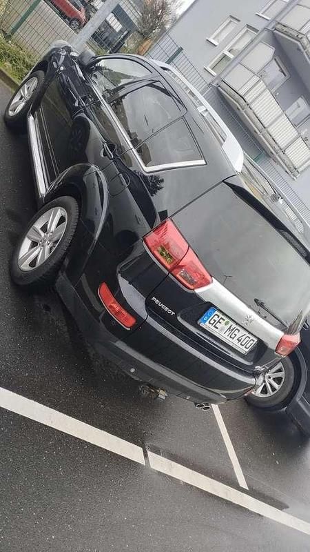Schwarz Gebraucht 2011 Peugeot 4007 Allure SUV | 7.500 € - Bild 1/4