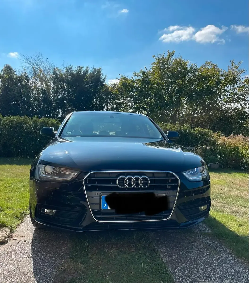 Używany Audi A4 Ambition 150 KM (110 kW) 2014 Czarny Sedan/Limuzyna