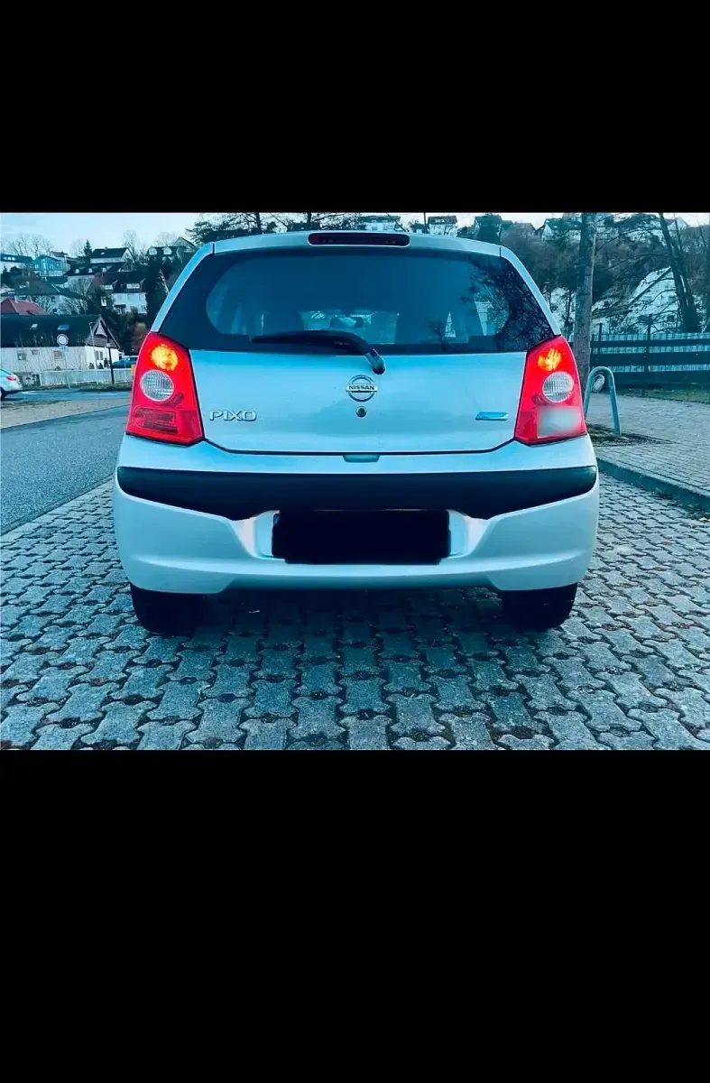 Gebraucht Nissan Pixo 68 PS (50 kW) 2009 Silber Kleinwagen