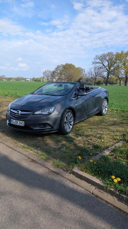 Grau Gebraucht 2013 Opel Cascada Cabrio | 7.950 € (Fairer Preis) - Bild 1/4