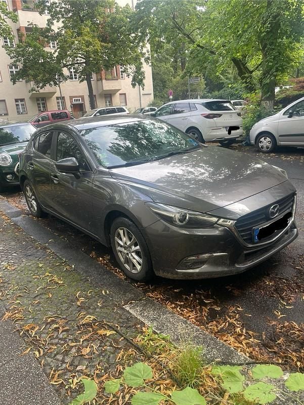 Grau Gebraucht 2018 Mazda 3 Exclusive-Line Limousine | 13.500 € (Fairer Preis) - Bild 1/4