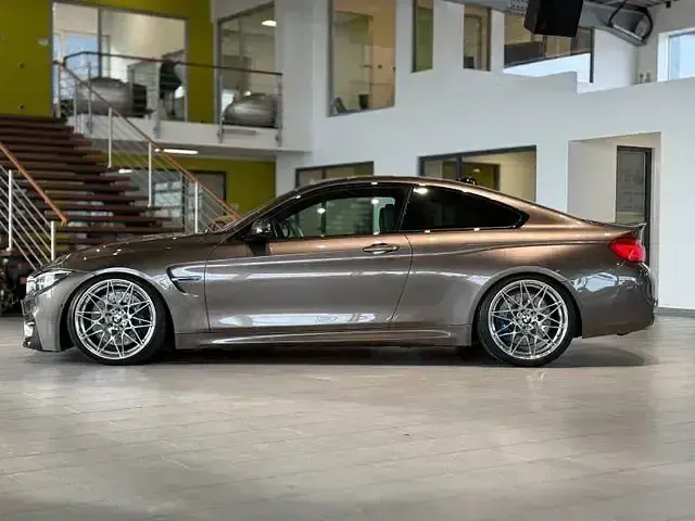 Używany BMW M4 Performance 450 KM (330 kW) 2019 Brązowy Coupe