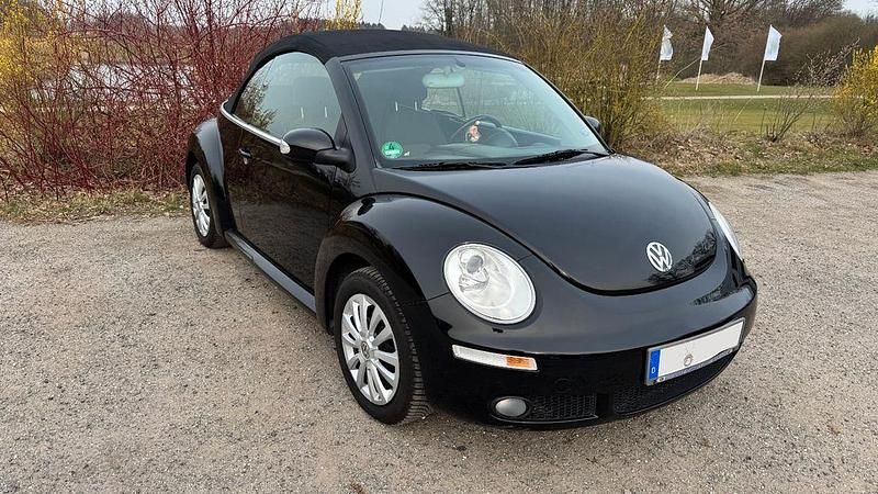 Gebraucht VW New Beetle 75 PS (55 kW) 2007 Schwarz Kleinwagen