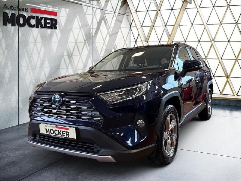 Dark blue metallic Gebraucht 2019 Toyota RAV4 Hybrid Lounge SUV | 24.990 € (Guter Preis) - Bild 1/4