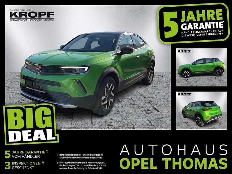 Lackierung matcha green/typ au Gebraucht 2023 Opel Mokka Elegance SUV | 20.490 € (Fairer Preis) - Bild 1/4