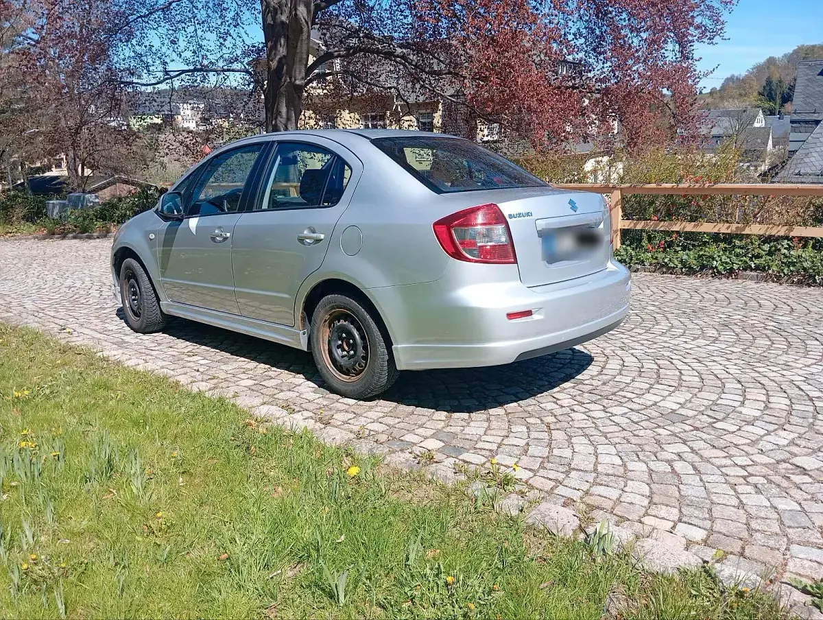 Gebraucht Suzuki SX4 120 PS (88 kW) 2012 Silber Limousine