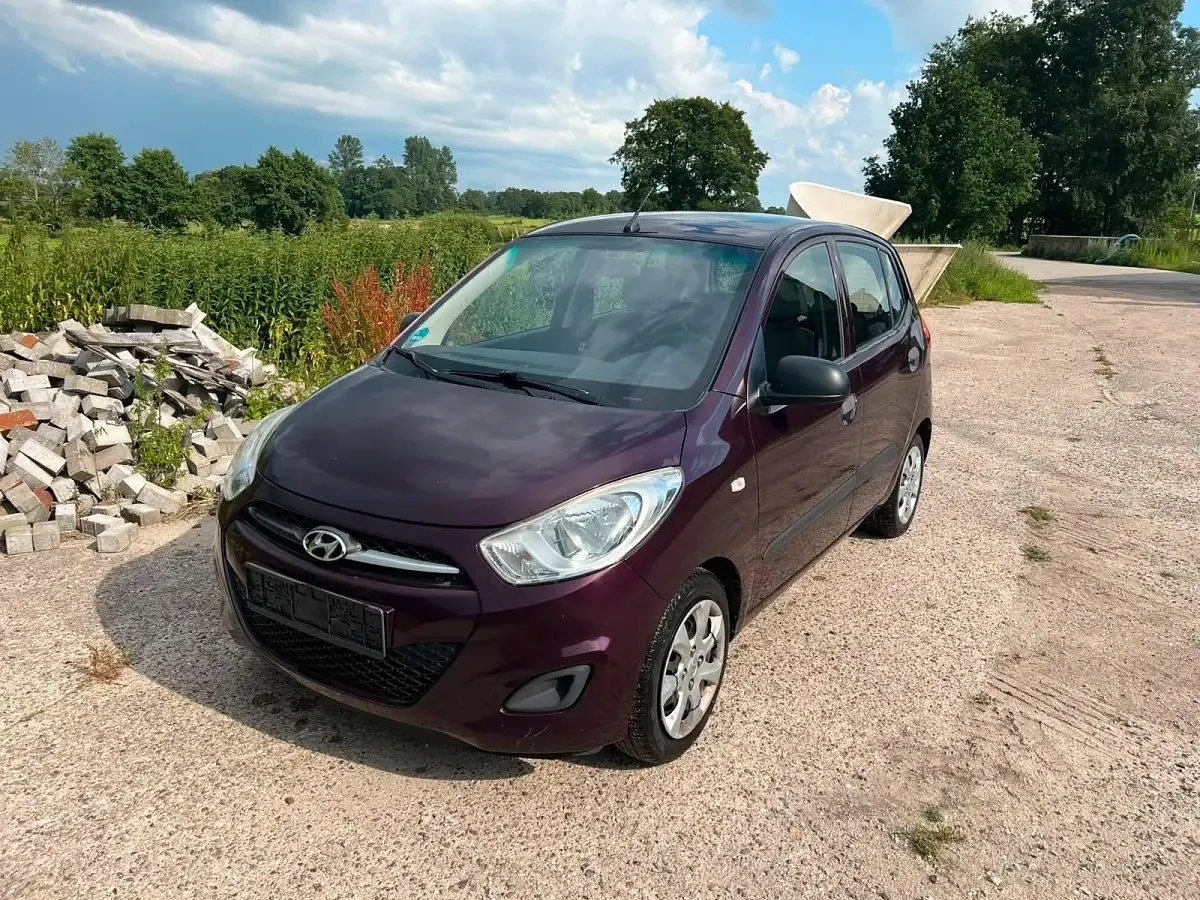 Gebraucht Hyundai i10 69 PS (50 kW) 2014 Rot Kleinwagen