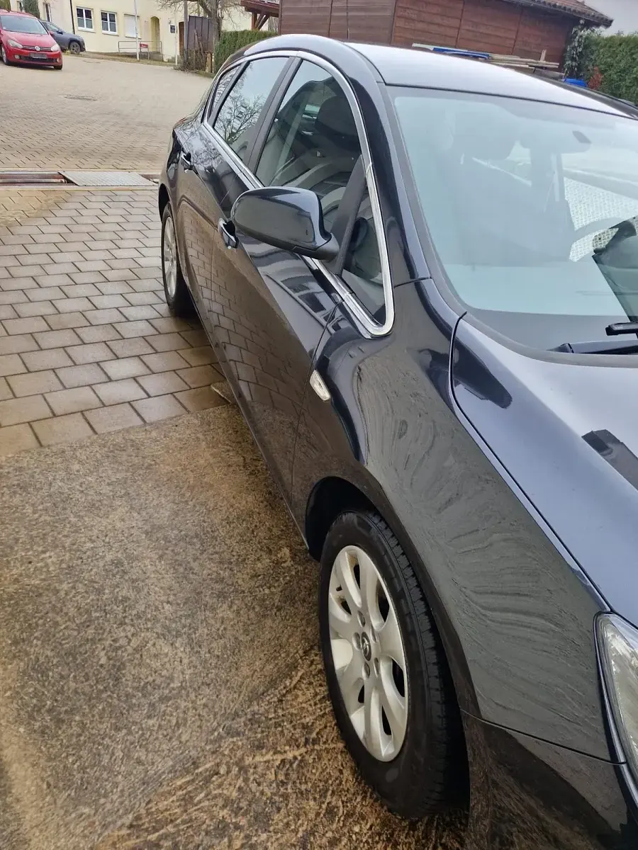 Używany Opel Astra 110 KM (80 kW) 2014 Czarny Kombi