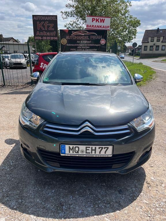 Grau Gebraucht 2014 Citroën C4 SELECTION Limousine | 4.299 € (Guter Preis) - Bild 1/4