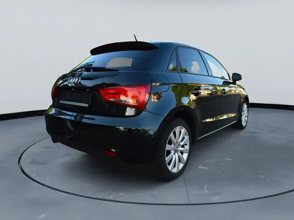 Gebraucht Audi A1 Sportback Attraction 90 PS (66 kW) 2013 Phantomschwarz Kleinwagen