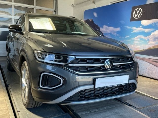 Indiumgrau Neu 2025 VW T-Roc Move SUV | 34.986 € (Superpreis) - Bild 1/4