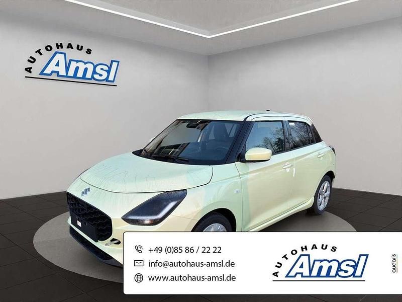Cool yellow Neu 2025 Suzuki Swift Comfort Limousine | 18.890 € - Bild 1/4