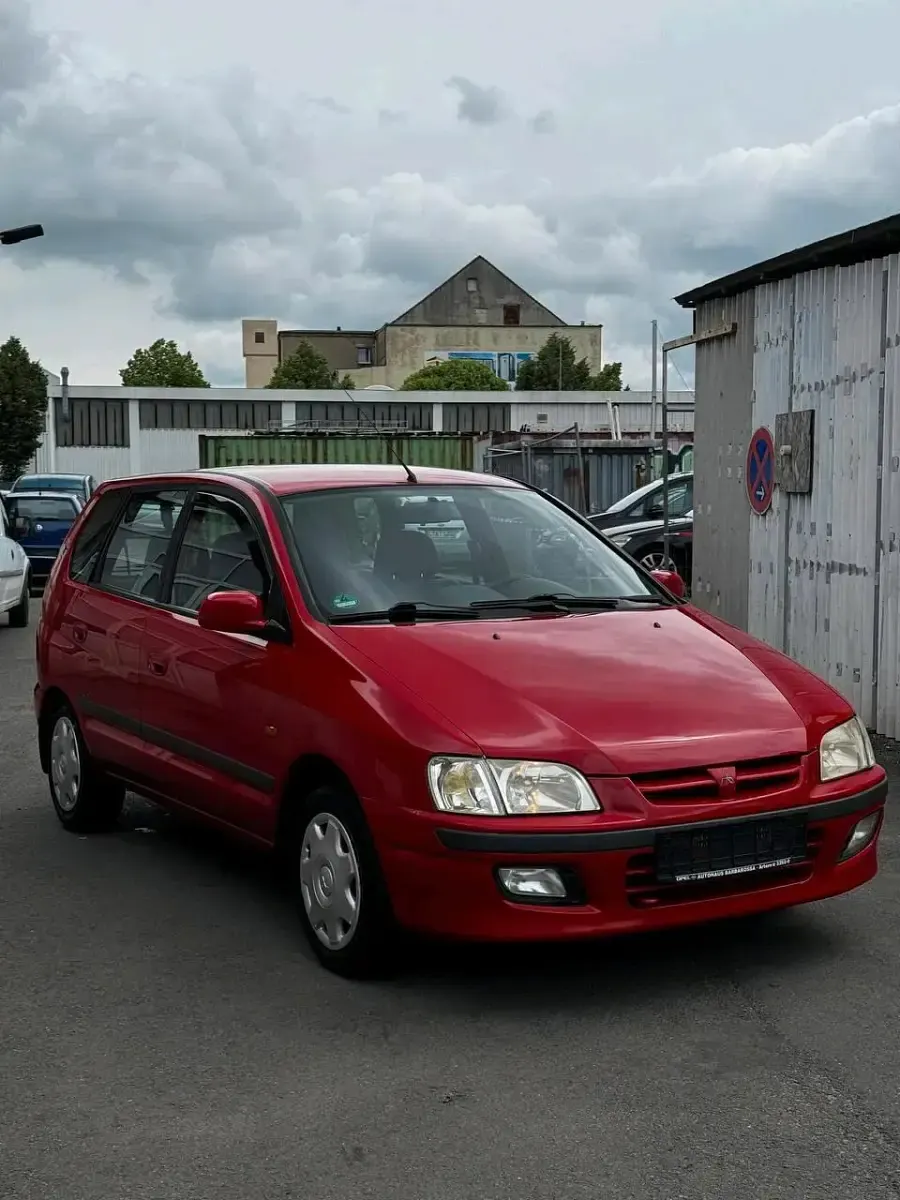 Gebraucht Mitsubishi Space Star 82 PS (60 kW) 2001 Rot Van / Kleinbus