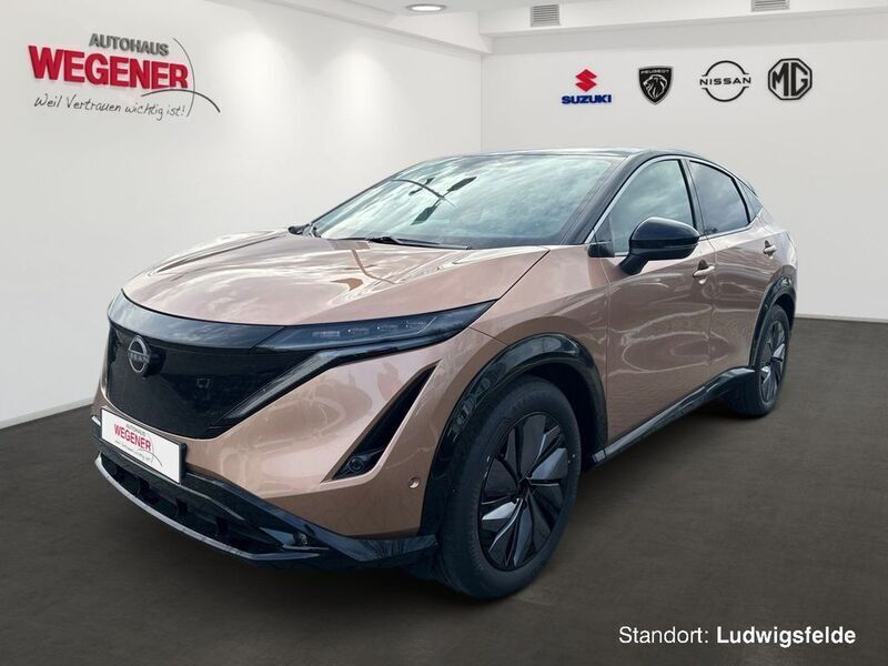 Akatsuki copper/pearl black Gebraucht 2024 Nissan Ariya Evolve SUV | 42.530 € (Fairer Preis) - Bild 1/4