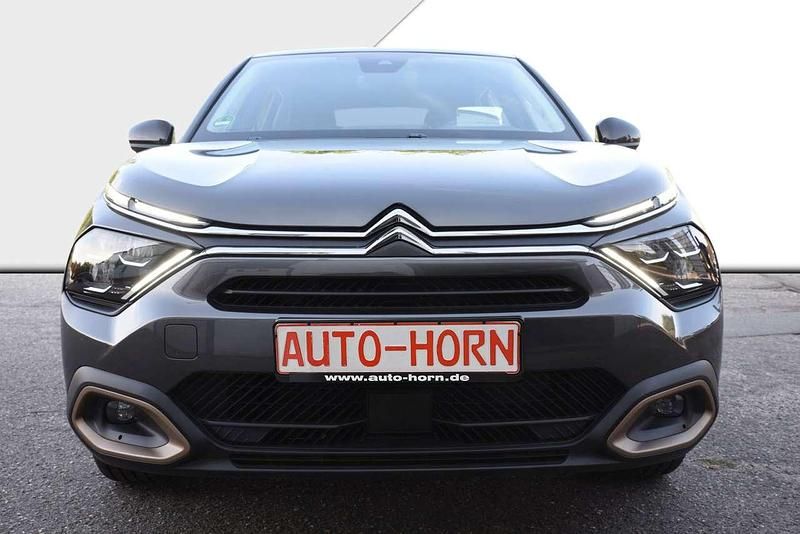 Gebraucht Citroën e-C4 100 kW (136 PS) 2024 Platinumgrau metallic Limousine