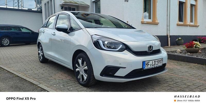 Weiß Gebraucht 2021 Honda Jazz Elegance Plus Kleinwagen | 18.990 € (Fairer Preis) - Bild 1/4