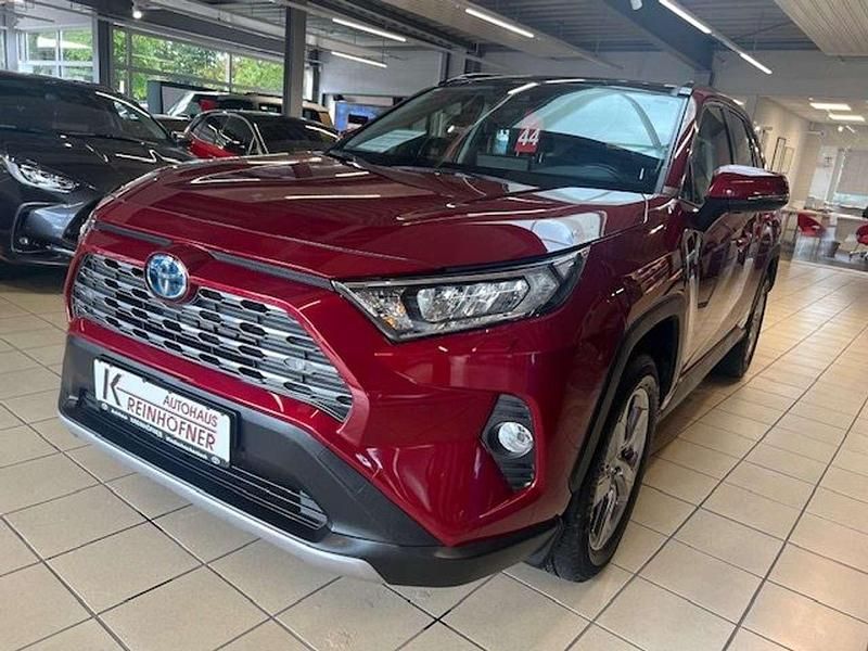 Tokiorot perl. Gebraucht 2021 Toyota RAV4 Hybrid Team SUV | 31.900 € (Fairer Preis) - Bild 1/4