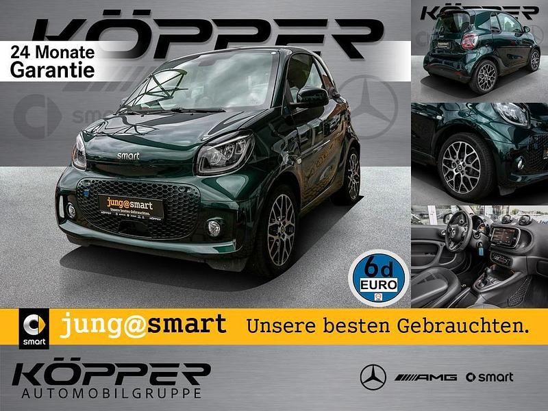 Racing green Gebraucht 2023 Smart ForTwo Electric Drive Exclusive Kleinwagen | 17.777 € (Etwas zu teuer) - Bild 1/4
