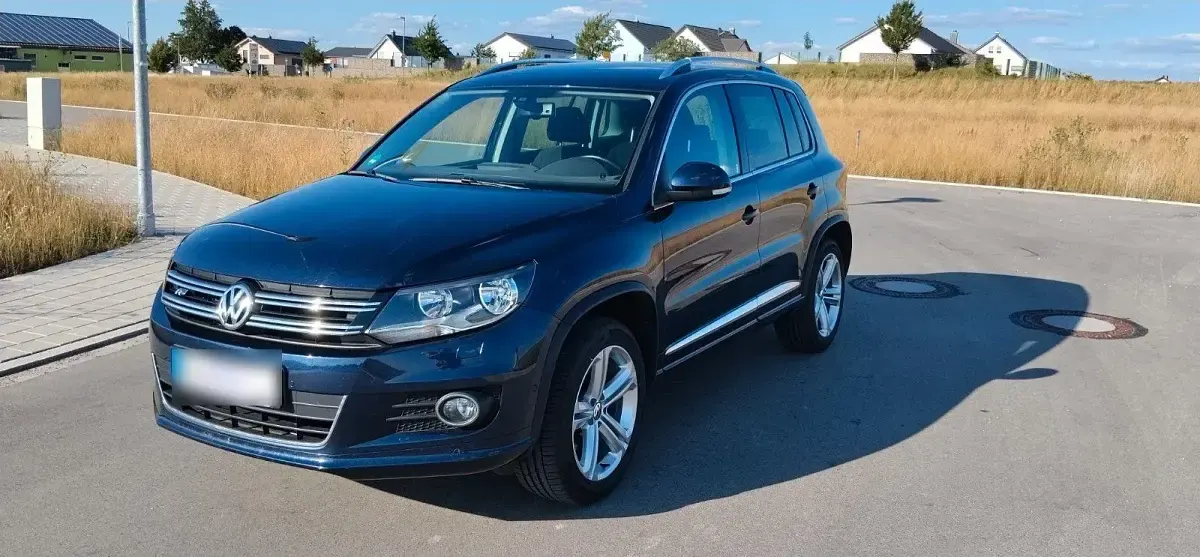 Gebraucht VW Tiguan Sportline 122 PS (89 kW) 2013 Blau SUV