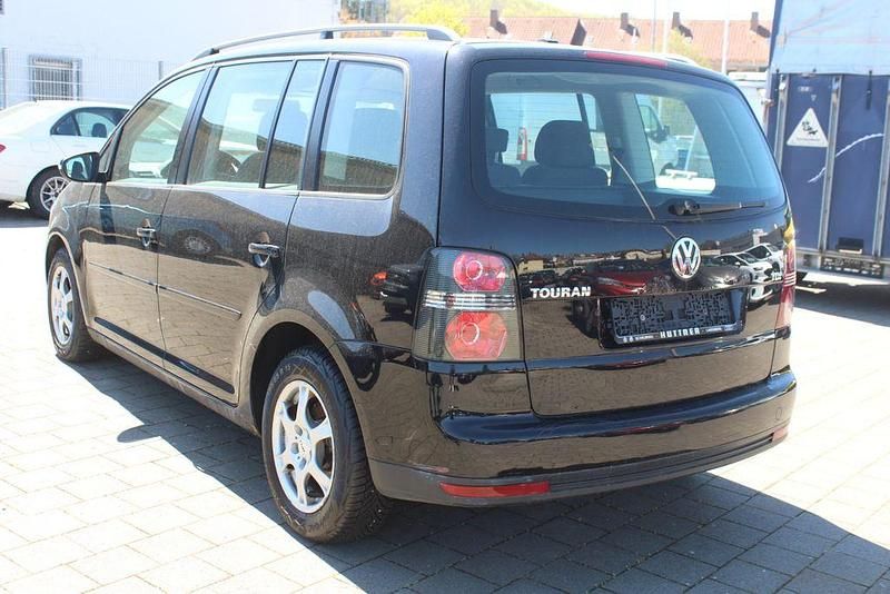 Gebraucht VW Touran Freestyle 105 PS (77 kW) 2010 Schwarz Van / Kleinbus