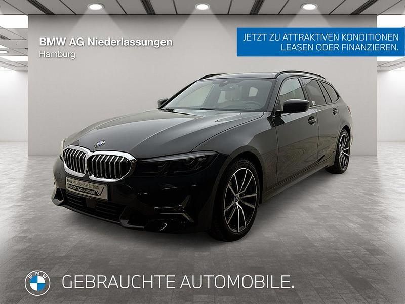 Grau Gebraucht 2021 BMW 320 Luxury Line Kombi | 30.901 € (Etwas zu teuer) - Bild 1/4
