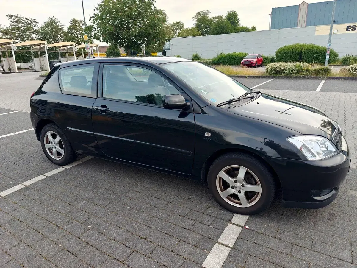 Gebraucht Toyota Corolla 97 PS (71 kW) 2003 Schwarz Limousine