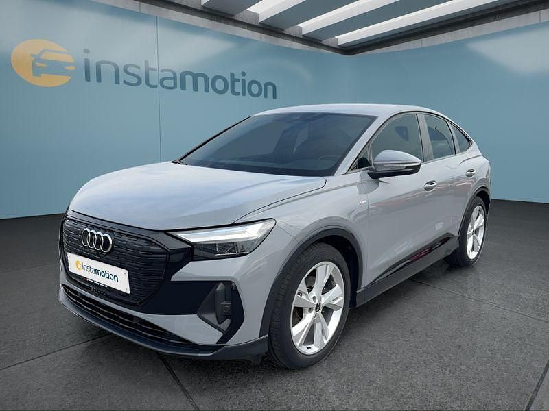 Grau Gebraucht 2022 Audi Q4 Sportback e-tron SUV | 29.299 € (Teuer) - Bild 1/4
