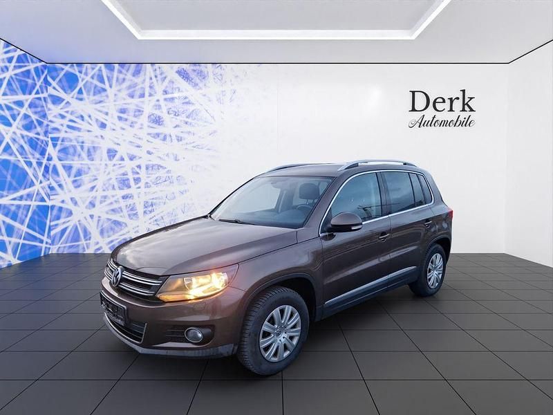 Braun Gebraucht 2012 VW Tiguan Sportline SUV | 5.950 € (Superpreis) - Bild 1/4