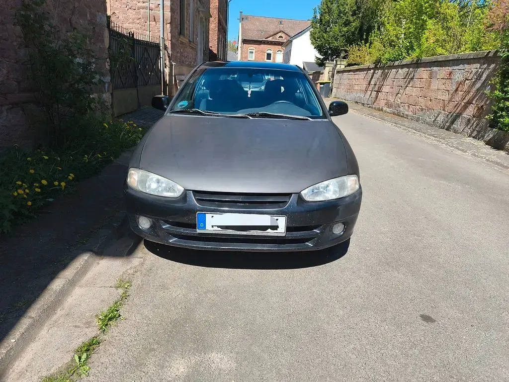 Second-hand Mitsubishi Colt 82 CP (60 kW) 2003 Negru Hatchback
