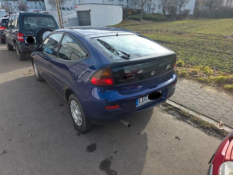 Gebraucht Mazda 323C 114 PS (83 kW) 1995 Blau Limousine