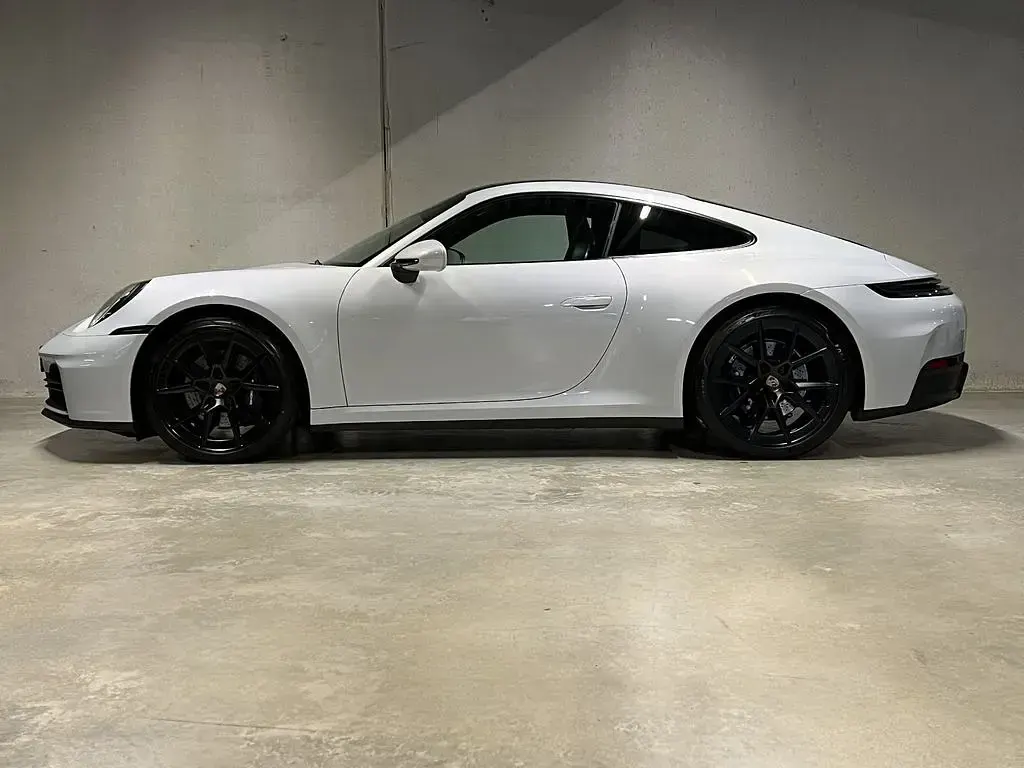 Gebraucht Porsche 911 Carrera 394 PS (289 kW) 2024 Eisgraumetallic Coupé