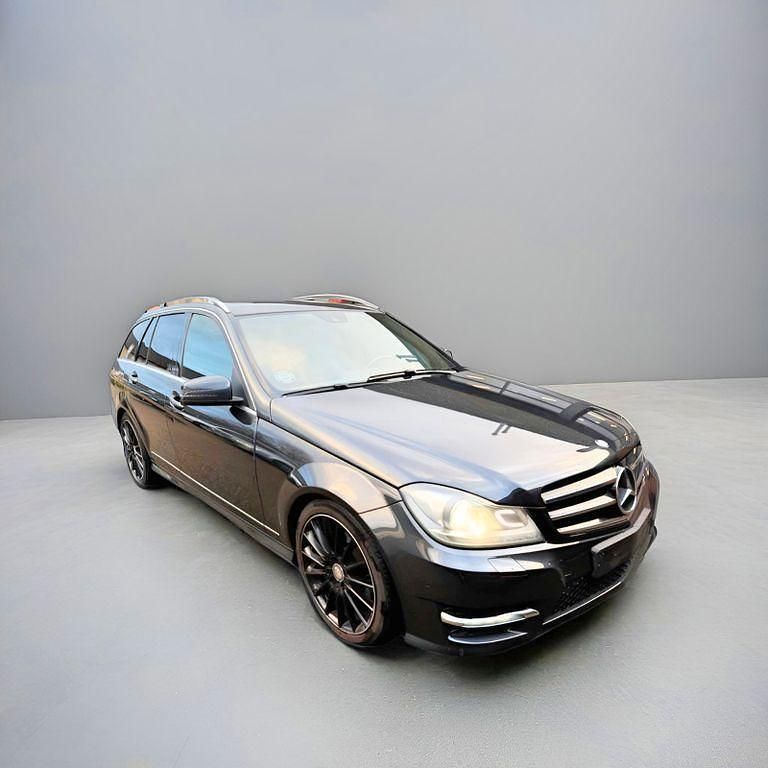 Schwarz Gebraucht 2013 Mercedes C250 AMG line Limousine | 7.695 € (Guter Preis) - Bild 1/4