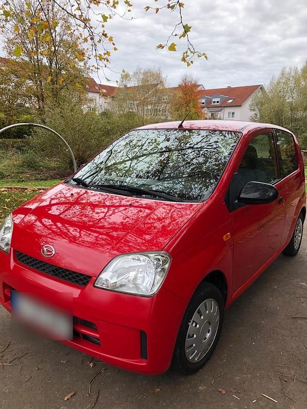 Gebraucht Daihatsu Cuore 58 PS (42 kW) 2004 Rot Kleinwagen