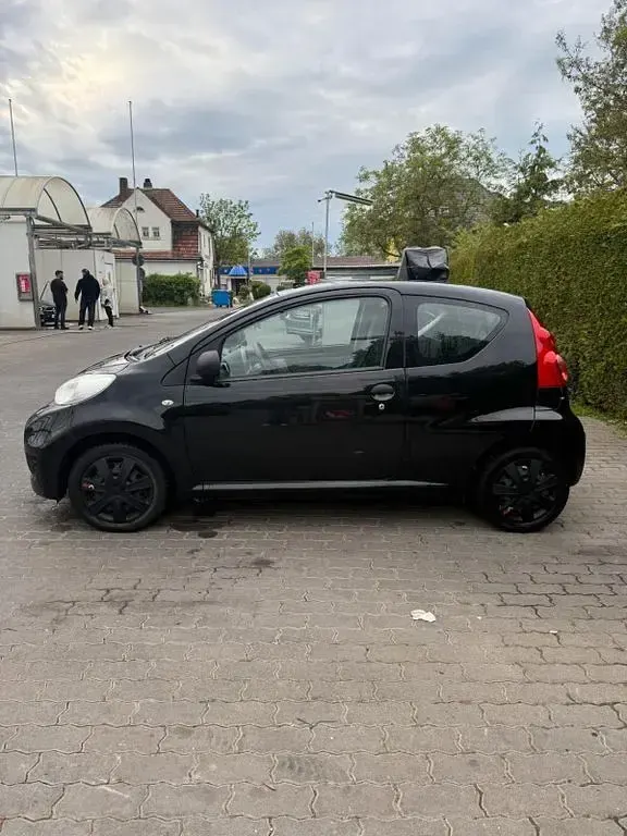 Gebraucht Peugeot 107 Filou 68 PS (50 kW) 2009 Schwarz Kleinwagen