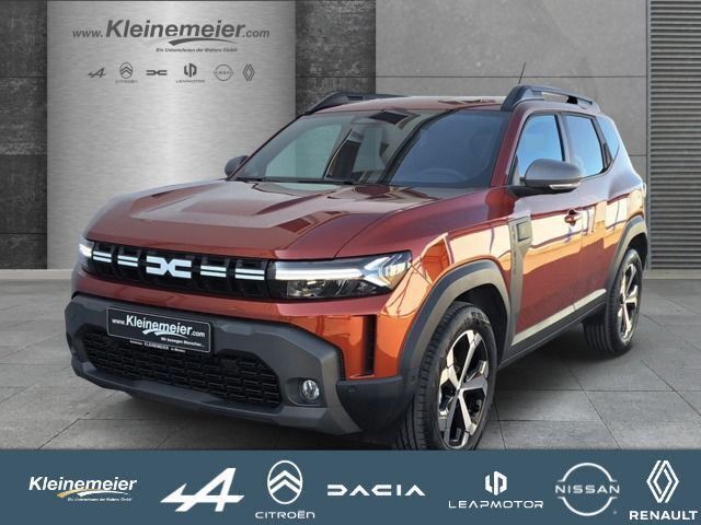 Braun Neu 2025 Dacia Duster Journey SUV | 26.325 € (Fairer Preis) - Bild 1/4