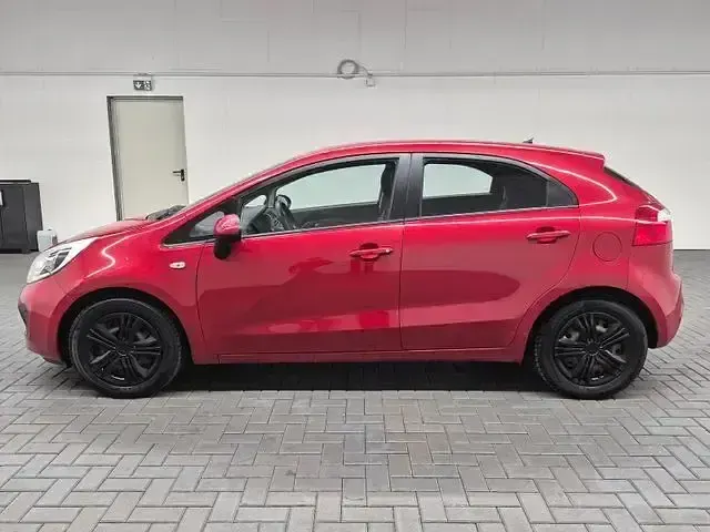 Gebraucht Kia Rio EX 86 PS (63 kW) 2013 Signal red (metallic) Kleinwagen