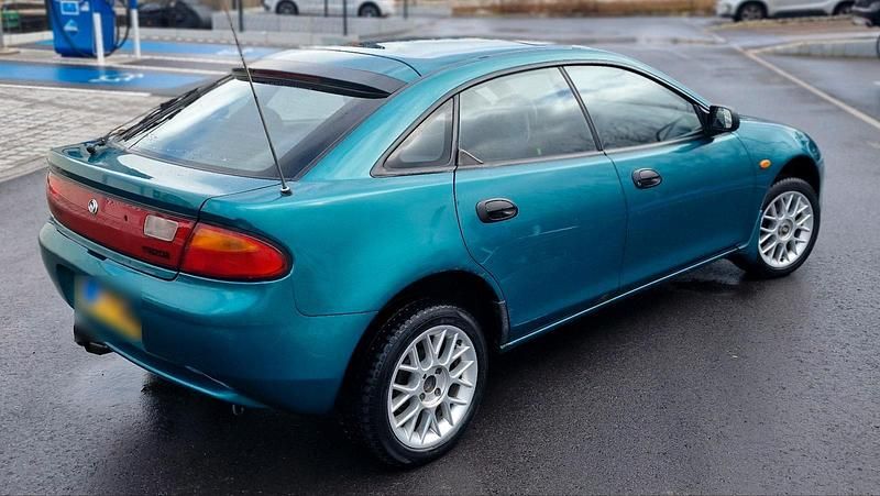 Gebraucht Mazda 323F 90 PS (66 kW) 1997 Blau Kleinwagen