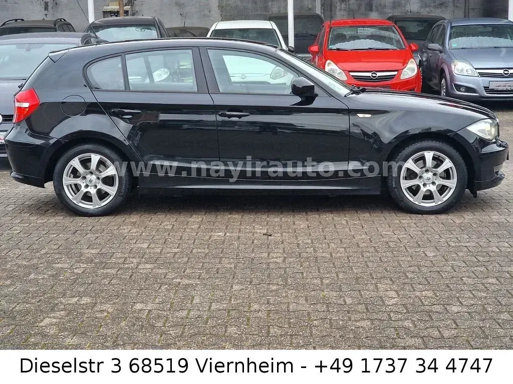 Käytetty BMW 116 Performance 122 HP (89 kW) 2010 Musta Viistoperä