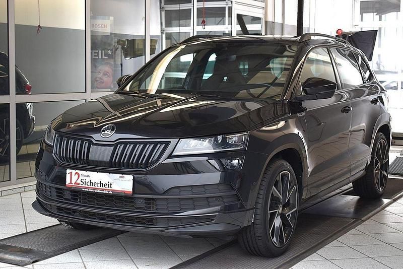 Schwarzmagic perleffekt Gebraucht 2021 Skoda Karoq SportLine SUV | 26.700 € (Fairer Preis) - Bild 1/4