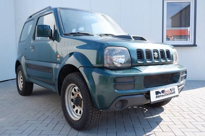 Grün Gebraucht 2006 Suzuki Jimny Comfort SUV | 6.990 € (Teuer) - Bild 1/4