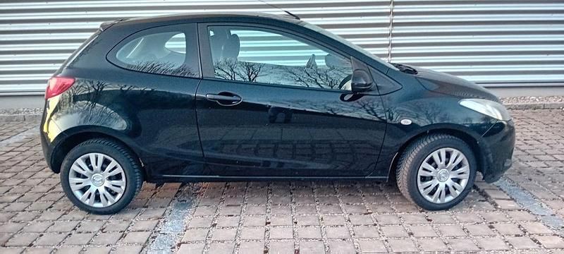 Gebraucht Mazda 2 Impuls 75 PS (55 kW) 2009 Schwarz Kleinwagen