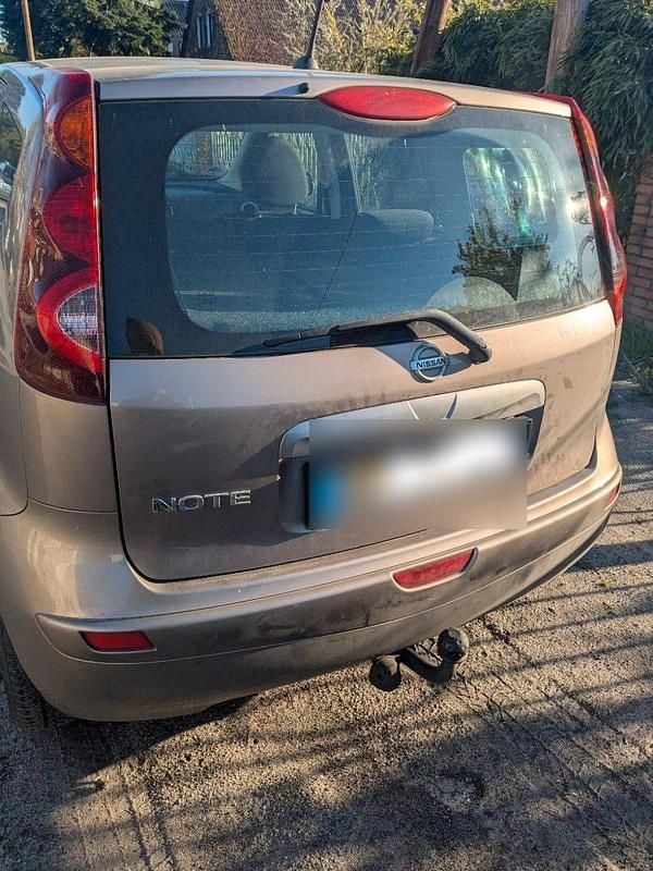 Second-hand Nissan Note 114 CP (83 kW) 2011 Auriu Hatchback